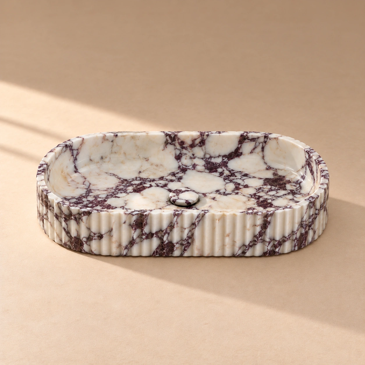 Lissa Sink - Calacatta Viola Lissa fluted oval countertop sink in Calacatta Viola marble, front view