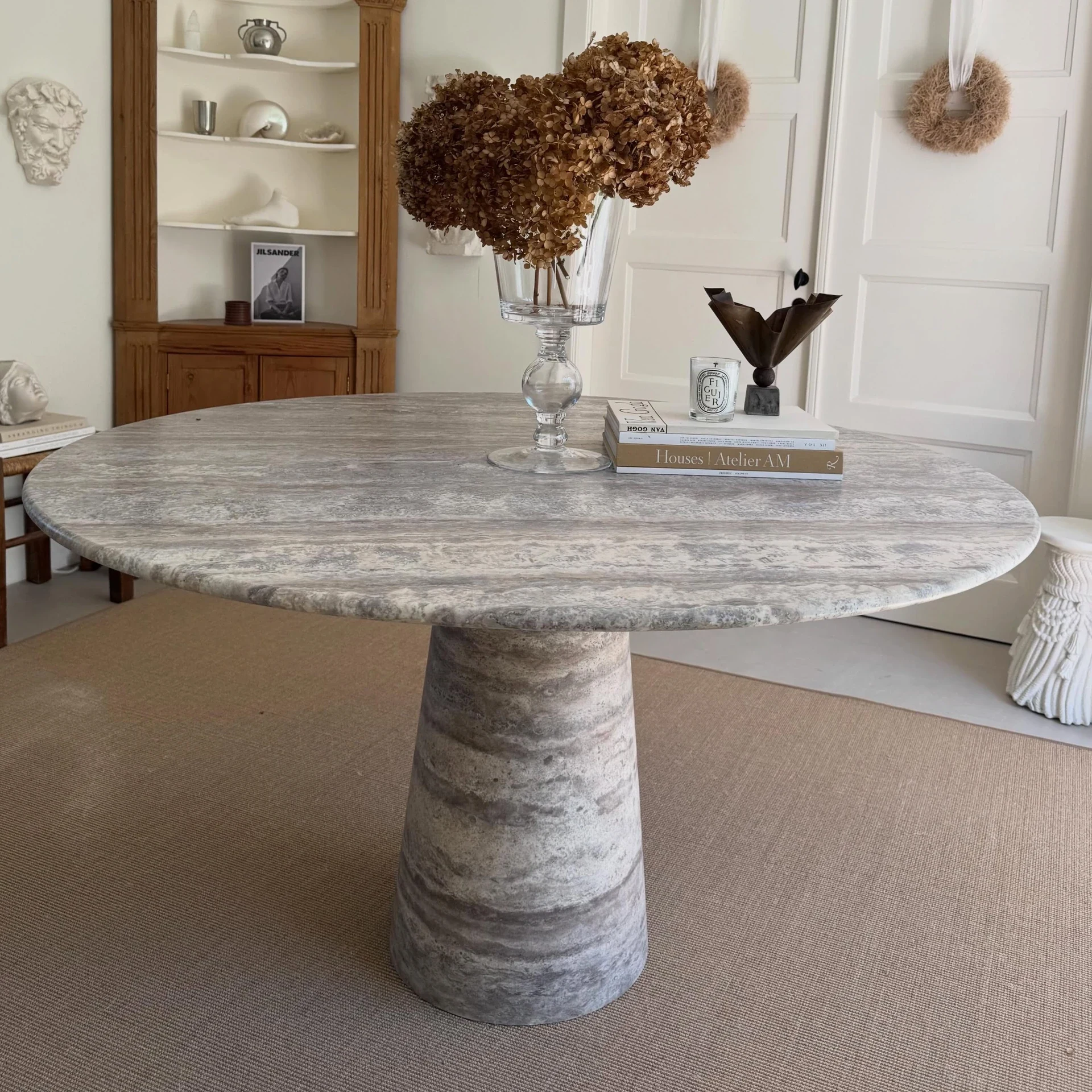 Limyra Dining Table in Silver Travertine: round top with single pedestal